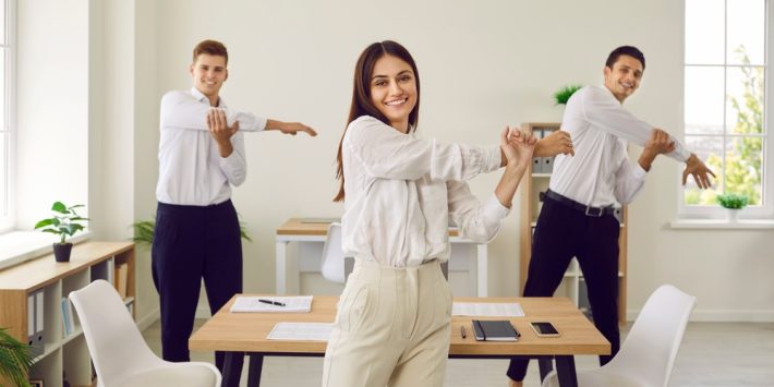 Portrait,Of,A,Happy,Young,Business,People,Doing,Stretching,Exercises